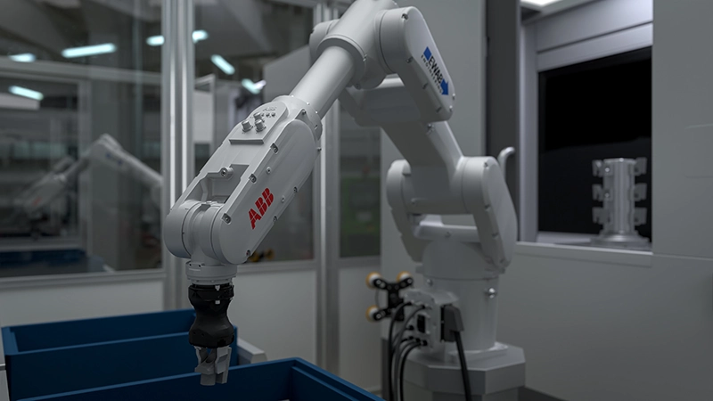 Robot ABB con nastro trasportatore e macchina